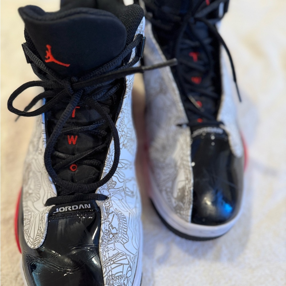 Jordan  men’s Black, White, and Red Sneakers